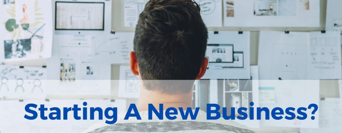 An entrepreneur viewing a wall of plans for their new business venture and ideas. Text: Starting A New Business?